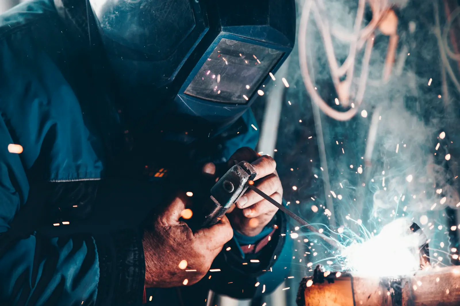 Stock photo of tools on a workbench, illustrating mechanical drain equipment